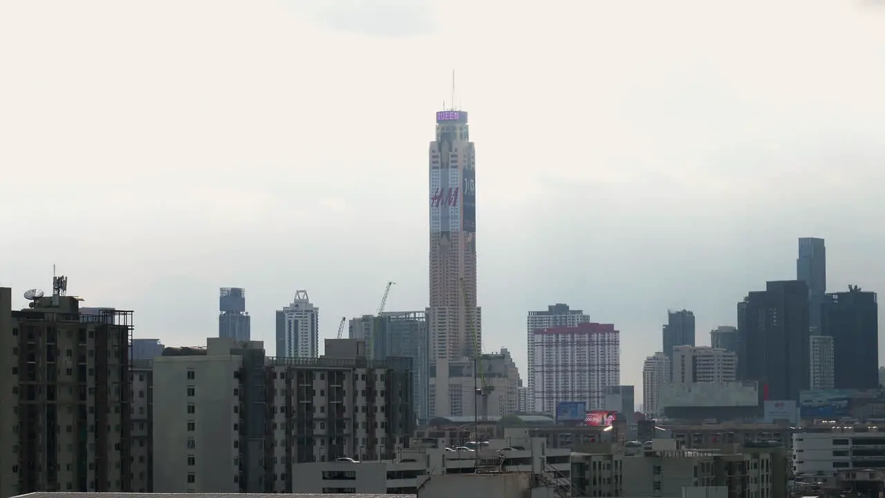 A view of Bangkok's cityscape shows Baiyoke Tower on a gloomy cloudy day