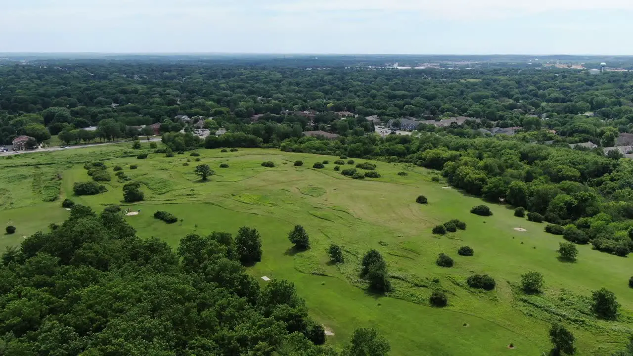 Aerial Forward Dolly Shot Over Beautiful Green Rural Landscape On Cloudy Day Panoramic View