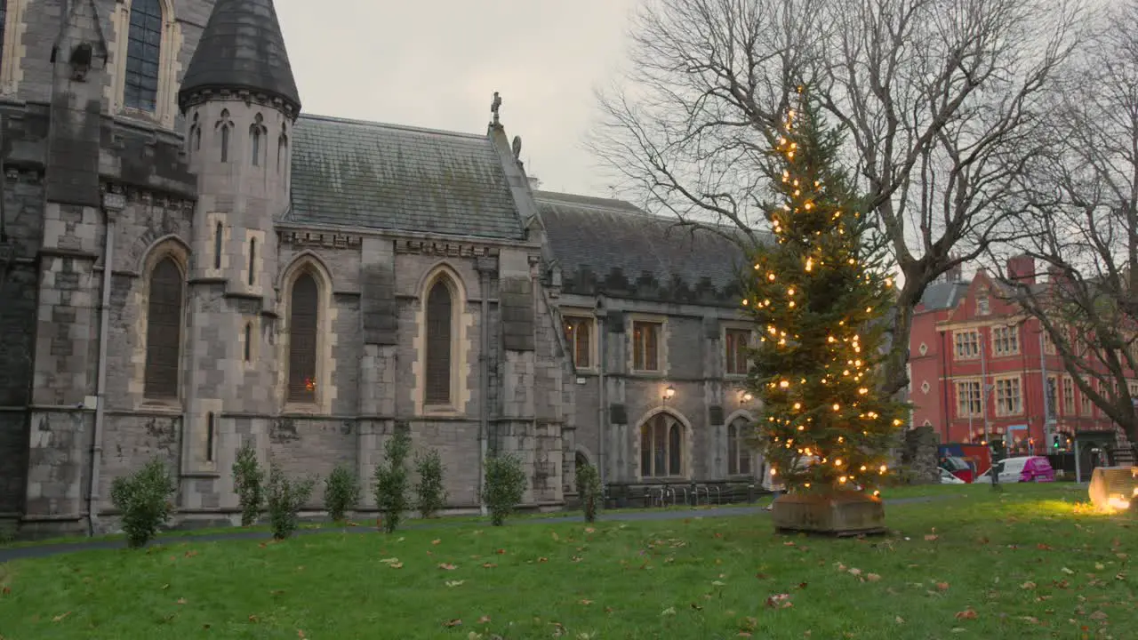 Pan shot of Christ Church Cathedral during the end of the year on a cloudy day in Dublin Ireland