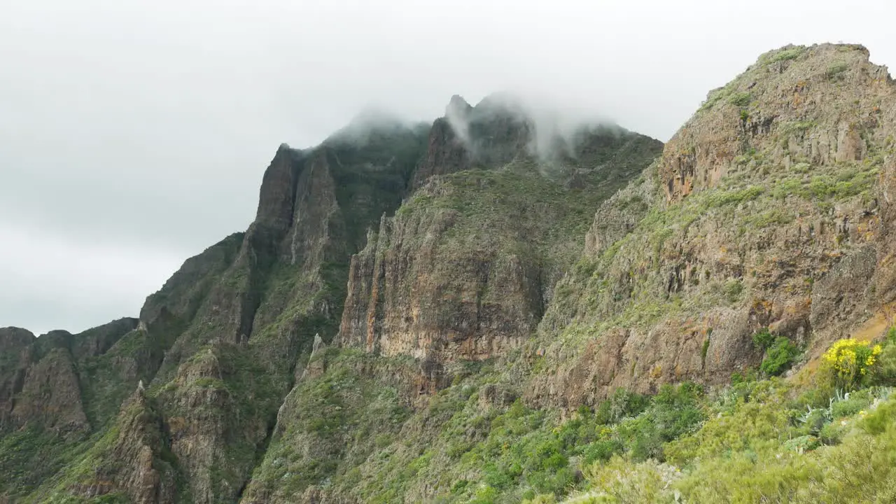 Cliffs in Masca with cloudy rolling around them Teno Tenerife Spain