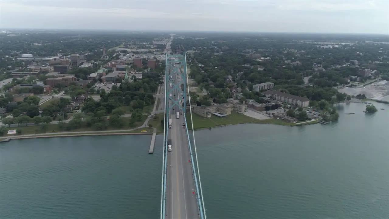 This video is about an aerial of the Ambassador Bridge over the Detroit river near downtown Detroit