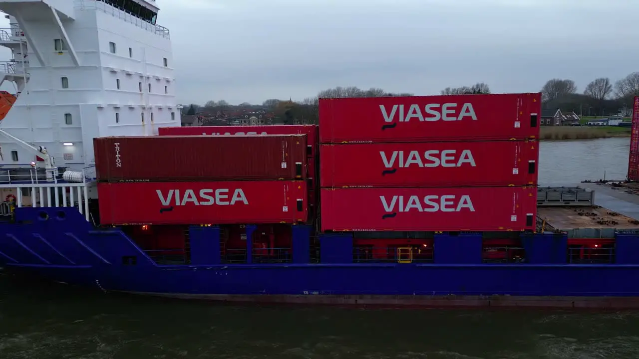 Aerial Dolly Towards Viasea Intermodal Containers Being Transported On Ship Near Dordrecht