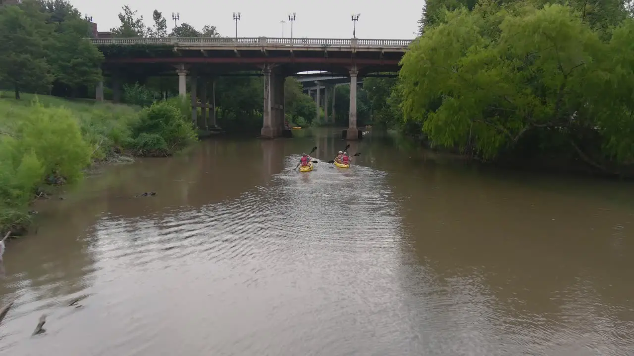 Aerial view of people kayaking on the Buffalo Bayou near downtown Houston