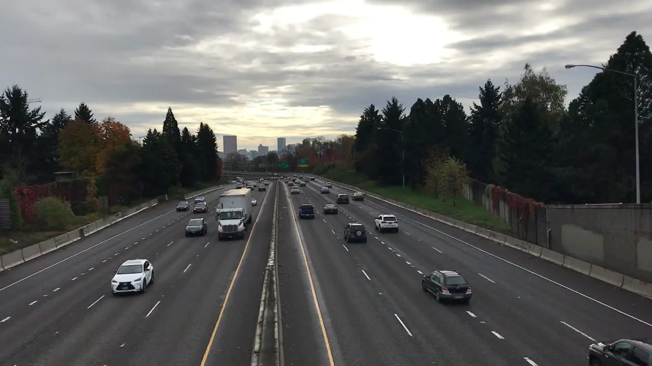 cars pass by on freeway below