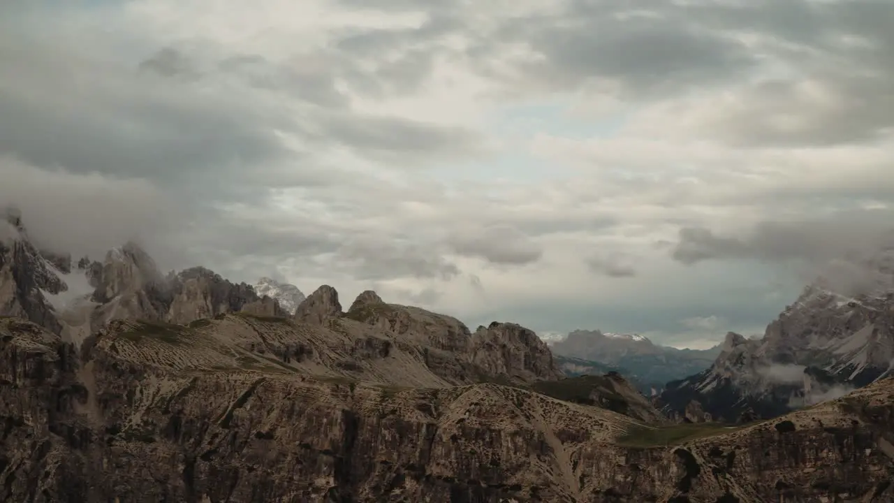 Slow pan over mountain range in the early morning in the Dolomites Italy 4k