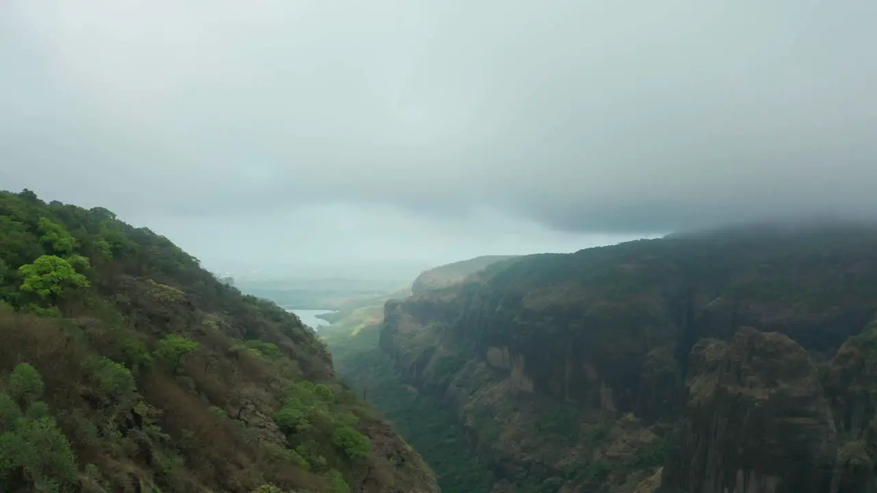 Thick Gray Clouds Over Western Ghats Mountain Range In Mulshi India During Monsoon Season aerial