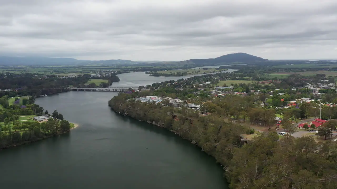 Aerial drone shot tracking to the left around Nowra and the Shoalhaven river on a stormy day in south coast NSW Australia