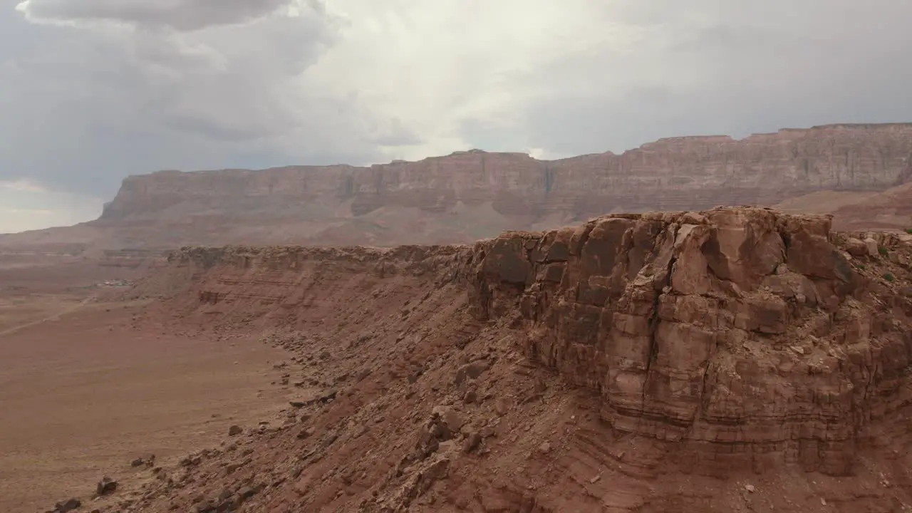 An aerial reveal of a small back country road in Arizona around the Grand Canyon