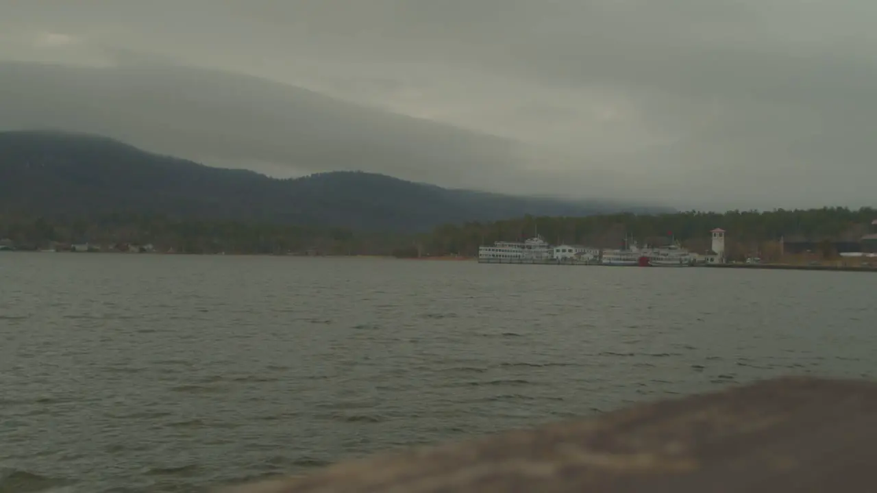 Steamboat floating in a lake far from shore line