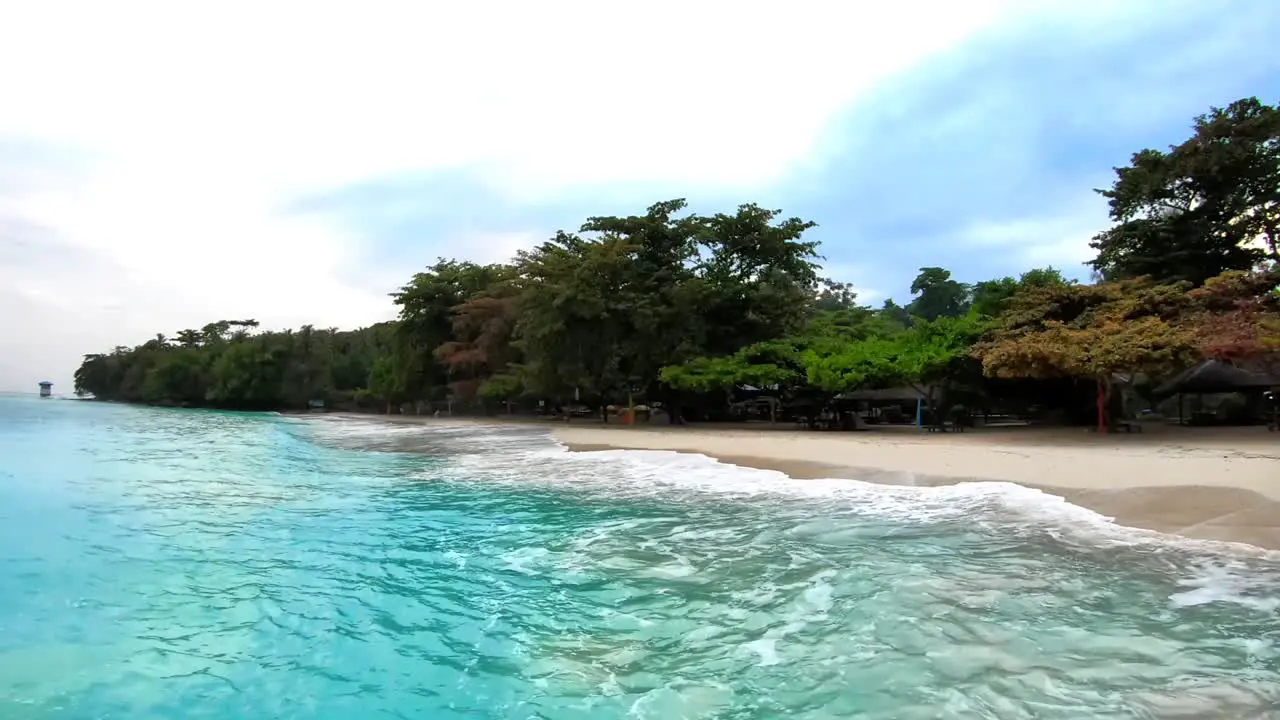 a view from the sea port seeing the beauty of the white sand beach resort