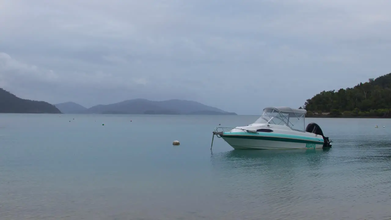 A boat at a tropical island wide shot