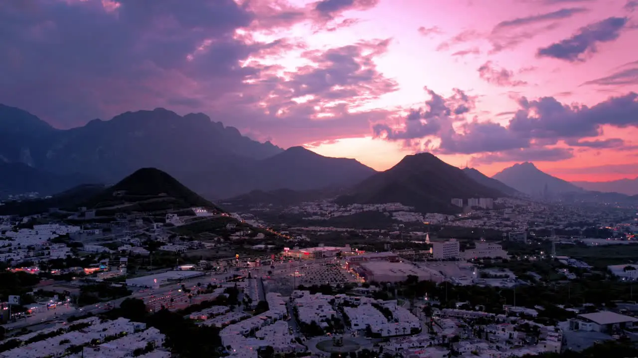 drone hyperlapse timelapse cloudy day sunset over sierra madre oriental at monterrey city mexico