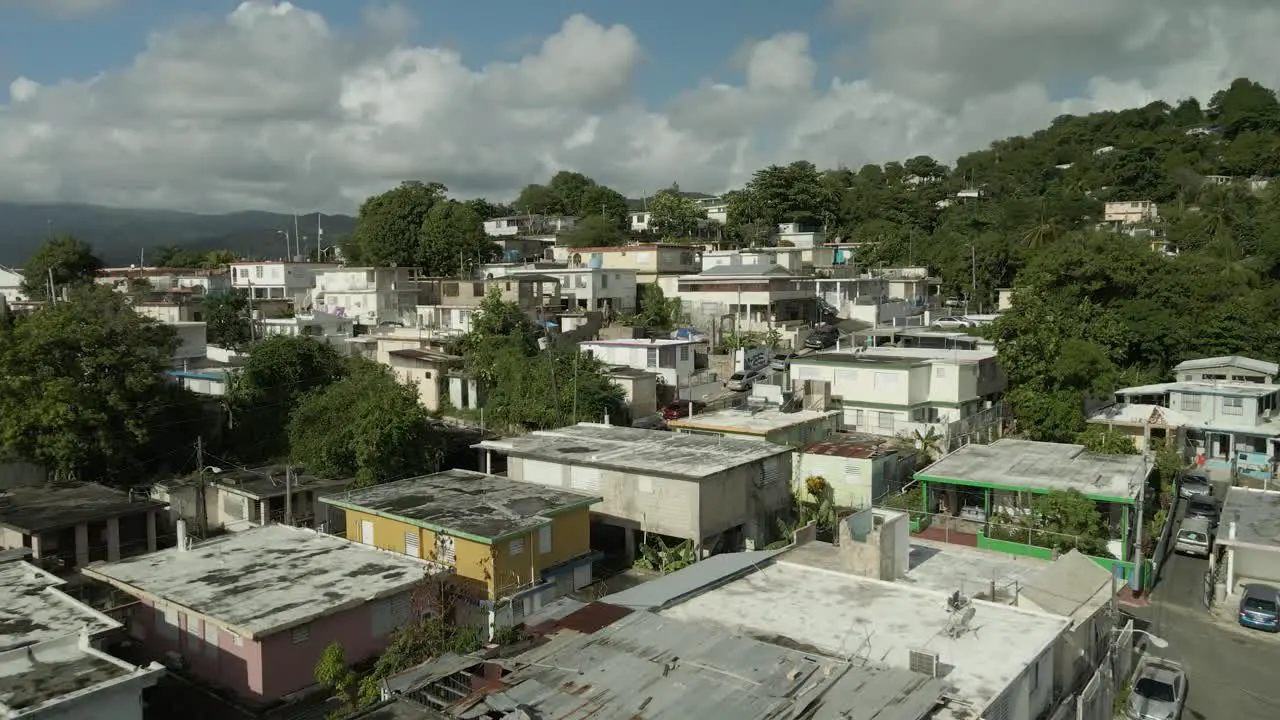 aerial drone shot flying over a mountain side hill puerto rico