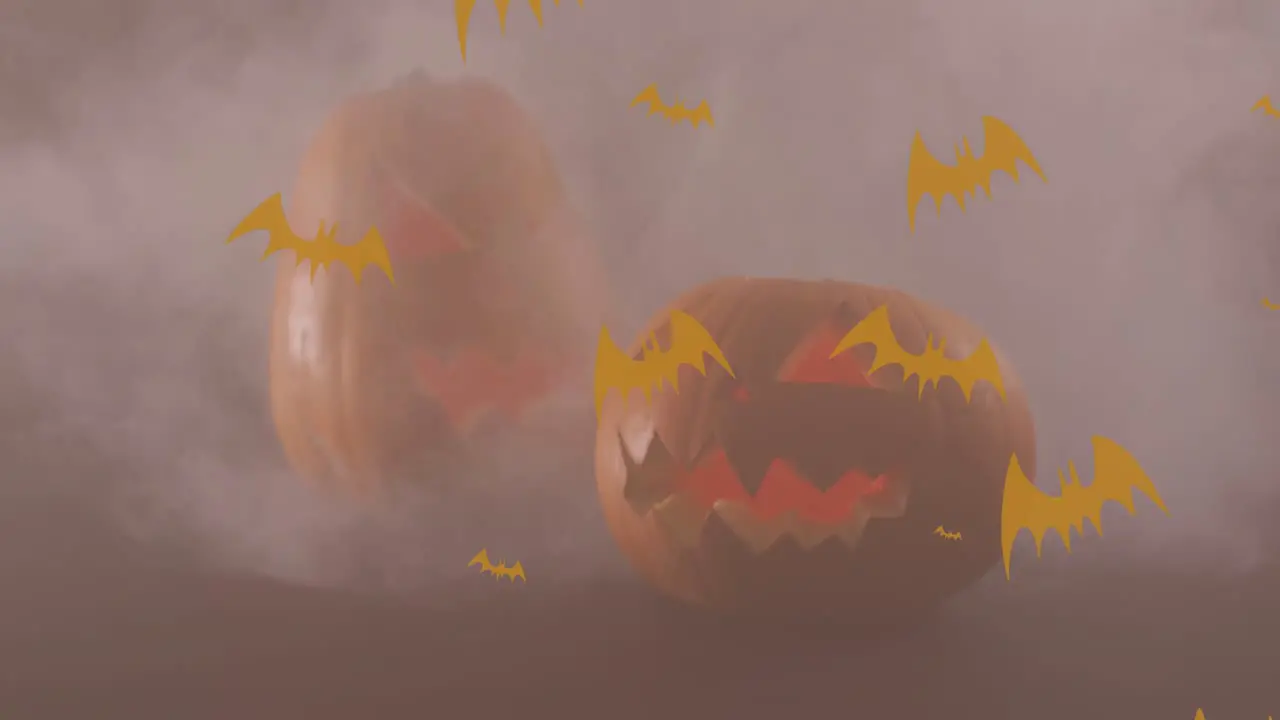 Animation of bats icons over halloween pumpkins