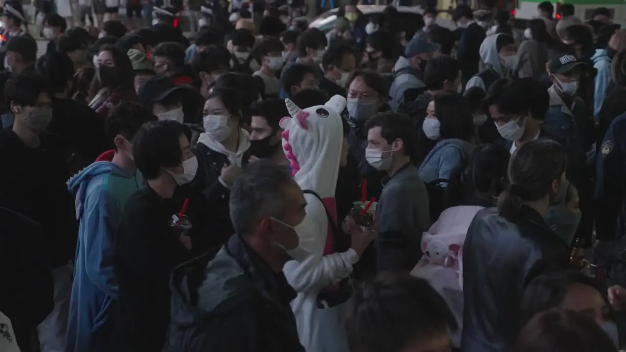 A Guy In Unicorn Costume Walking Along With The Crowd At Shibuya Crossing On Halloween Night 2020 In Tokyo Japan Slow Motion