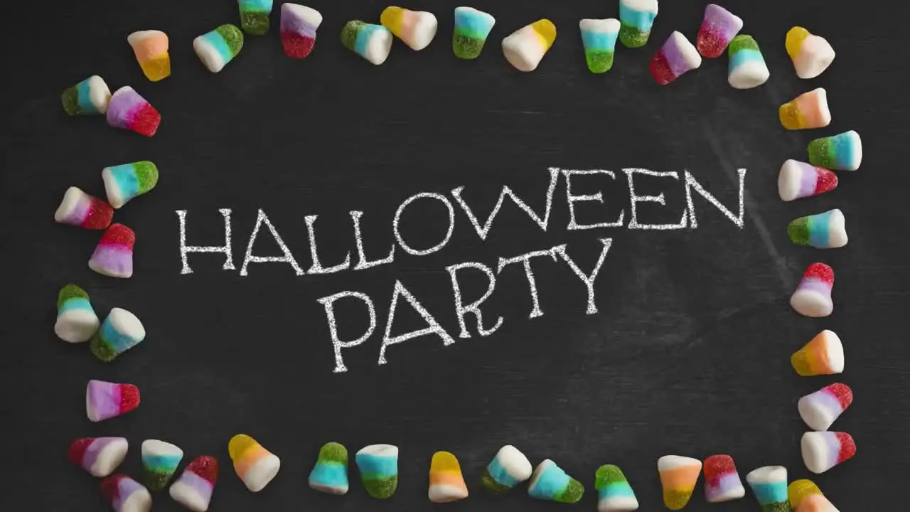 Animation of halloween party text over sweets