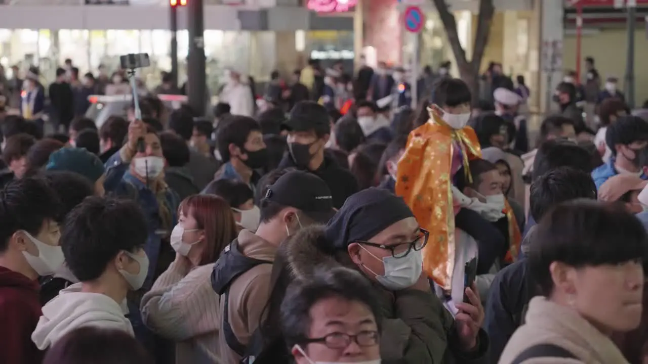 Crowd Of People Wearing Masks At Shibuya Crossing On Halloween Night Pandemic Holiday In Japan slow motion