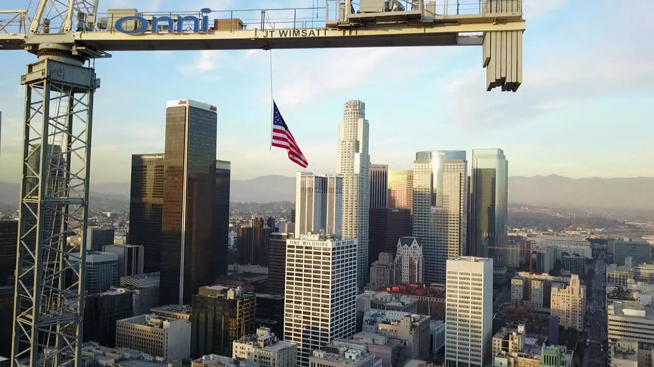 American flag flies over city