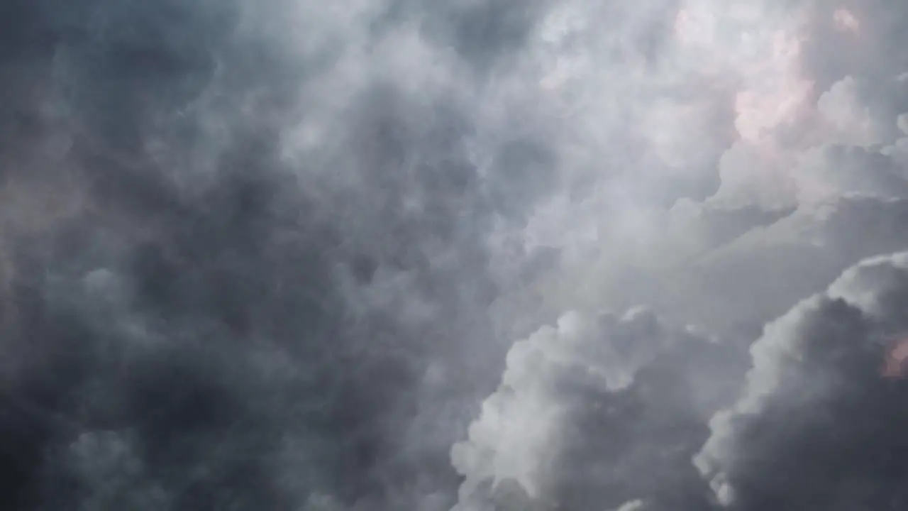 Cumulonimbus clouds and thunderstorms in the dark sky