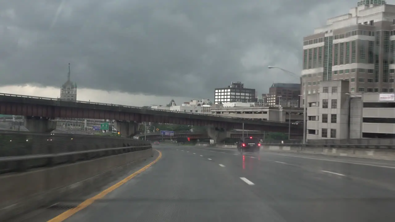 Driving on a highway during a rainstorm