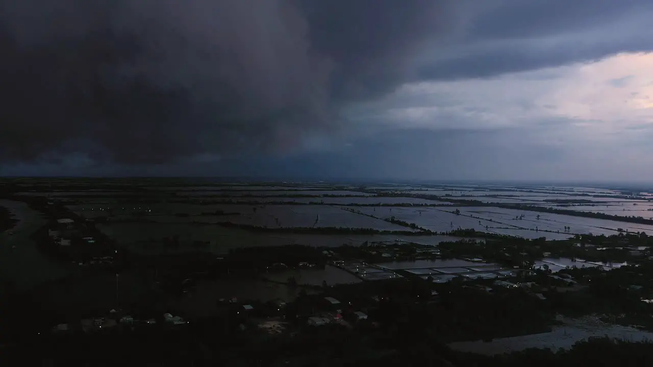 Aerial panning view of of evening storm over Mekong Delta in Vietnam