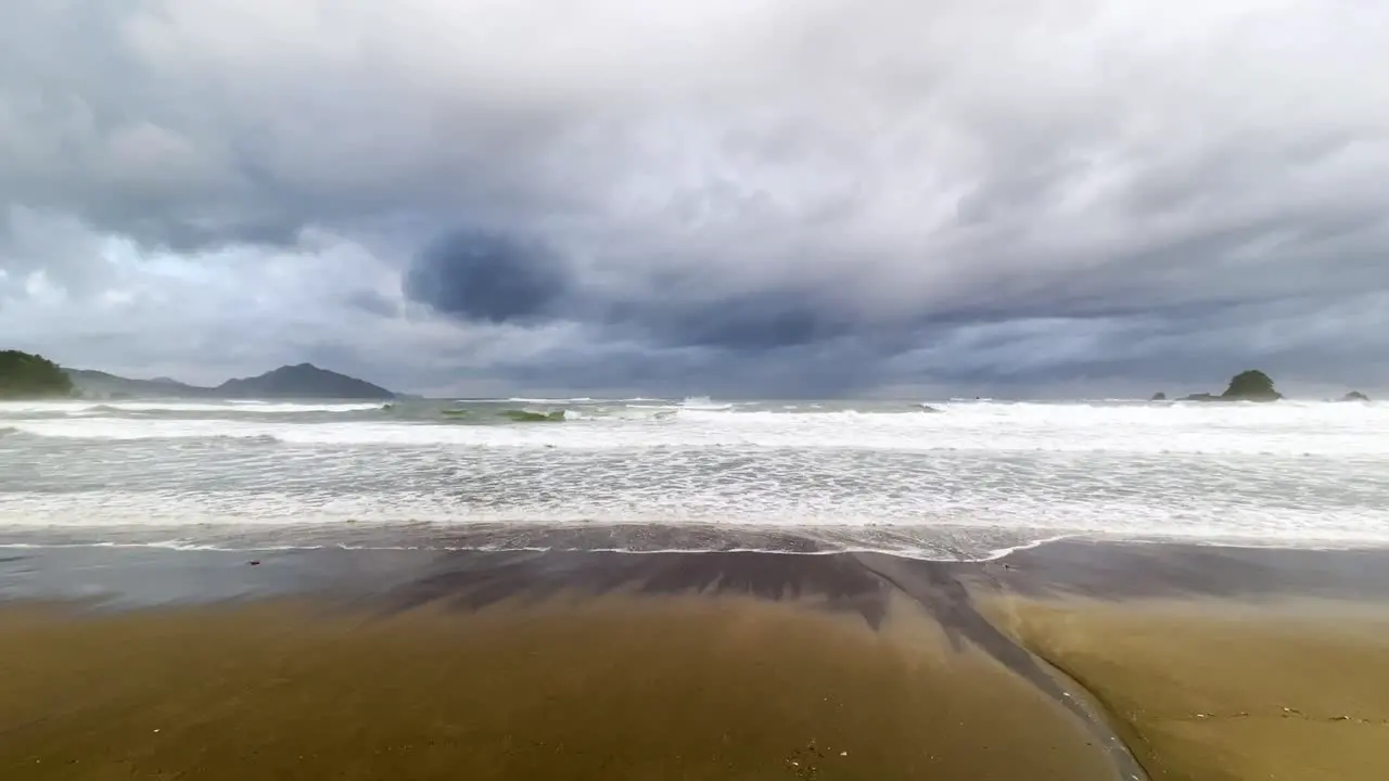 Wide angle shot of a remote beach overlooking the Sea of Japan on a cloudy day with stormy seas