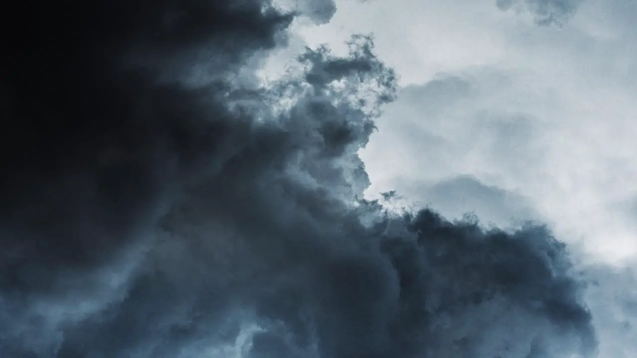 thunderstorm dark cumulonimbus clouds moving in the sky with lightning strike