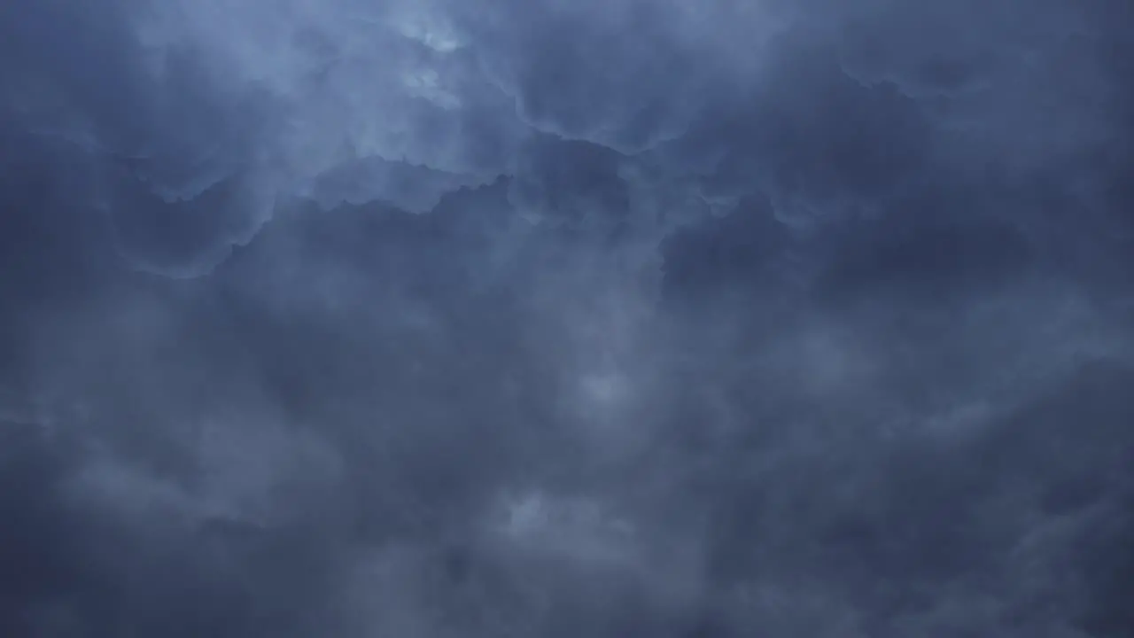 thick clouds in the dark sky thunderstorm