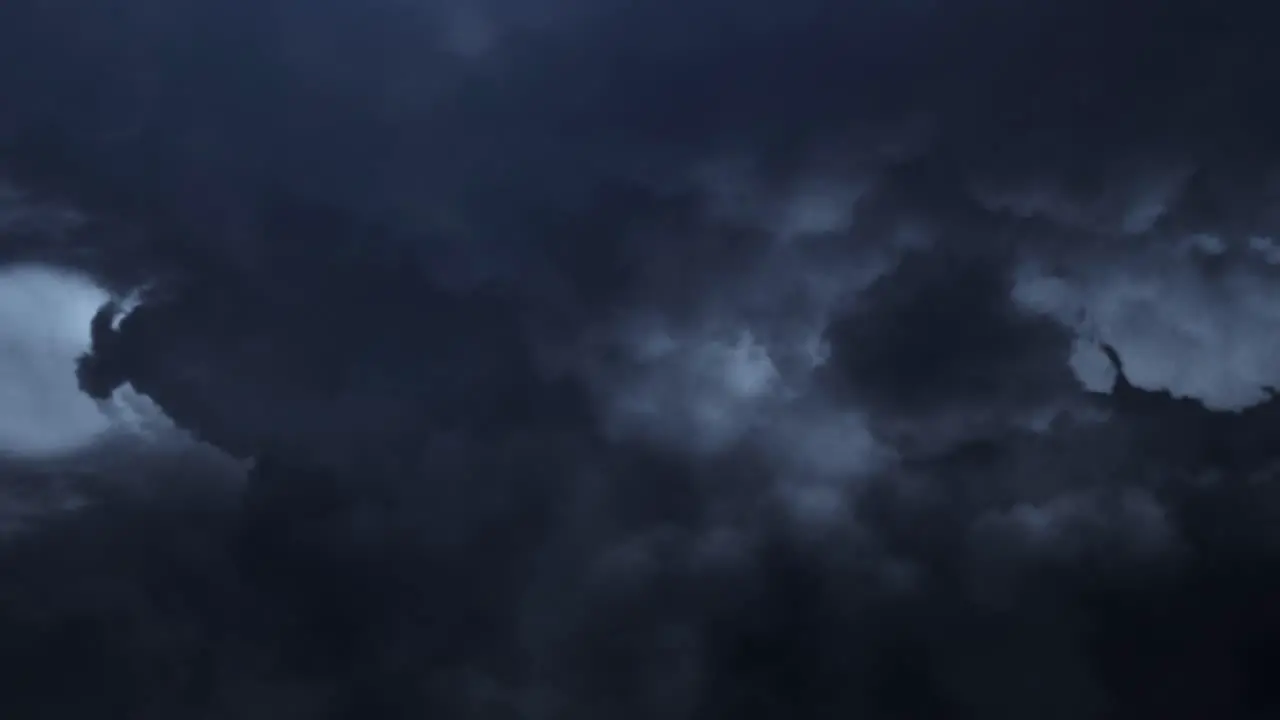 thunderstorm inside dark cumulonimbus clouds moving closer