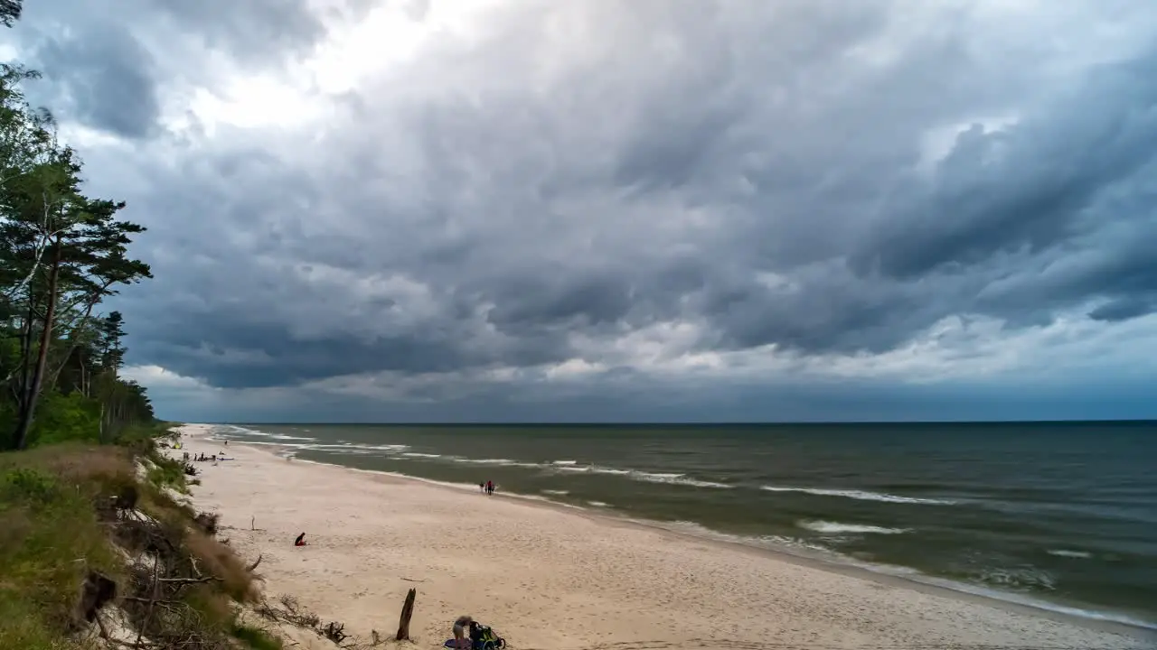 Storm Clouds Over Sea and Sandy Beach Time Lapse