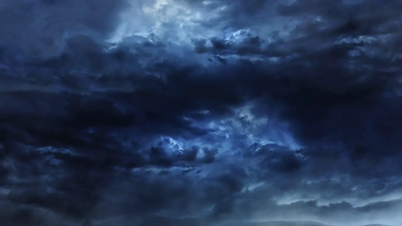 a dark blue cloud moving with a thunderstorm in it