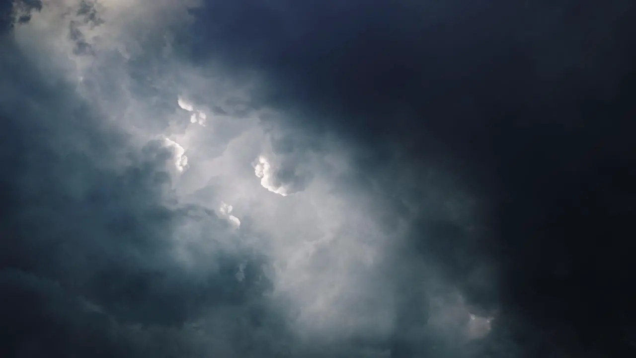 4k thunderstorm point of view inside dark and moving cumulonimbus clouds