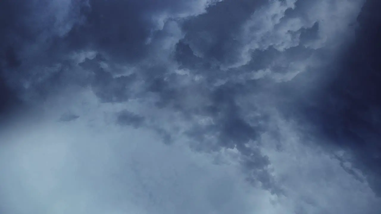 timelapse a thunderstorm in the dark sky and cumulonimbus clouds moving in the sky