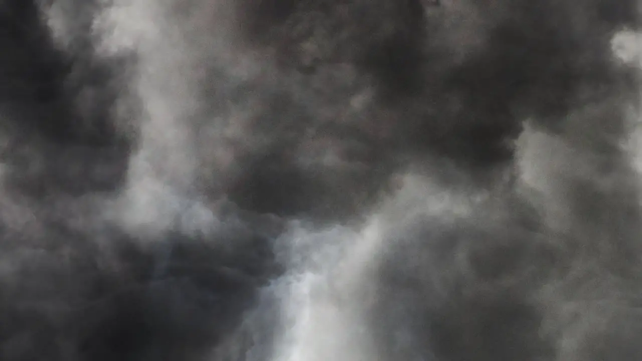 view of a thunderstorm inside a moving dark cloud