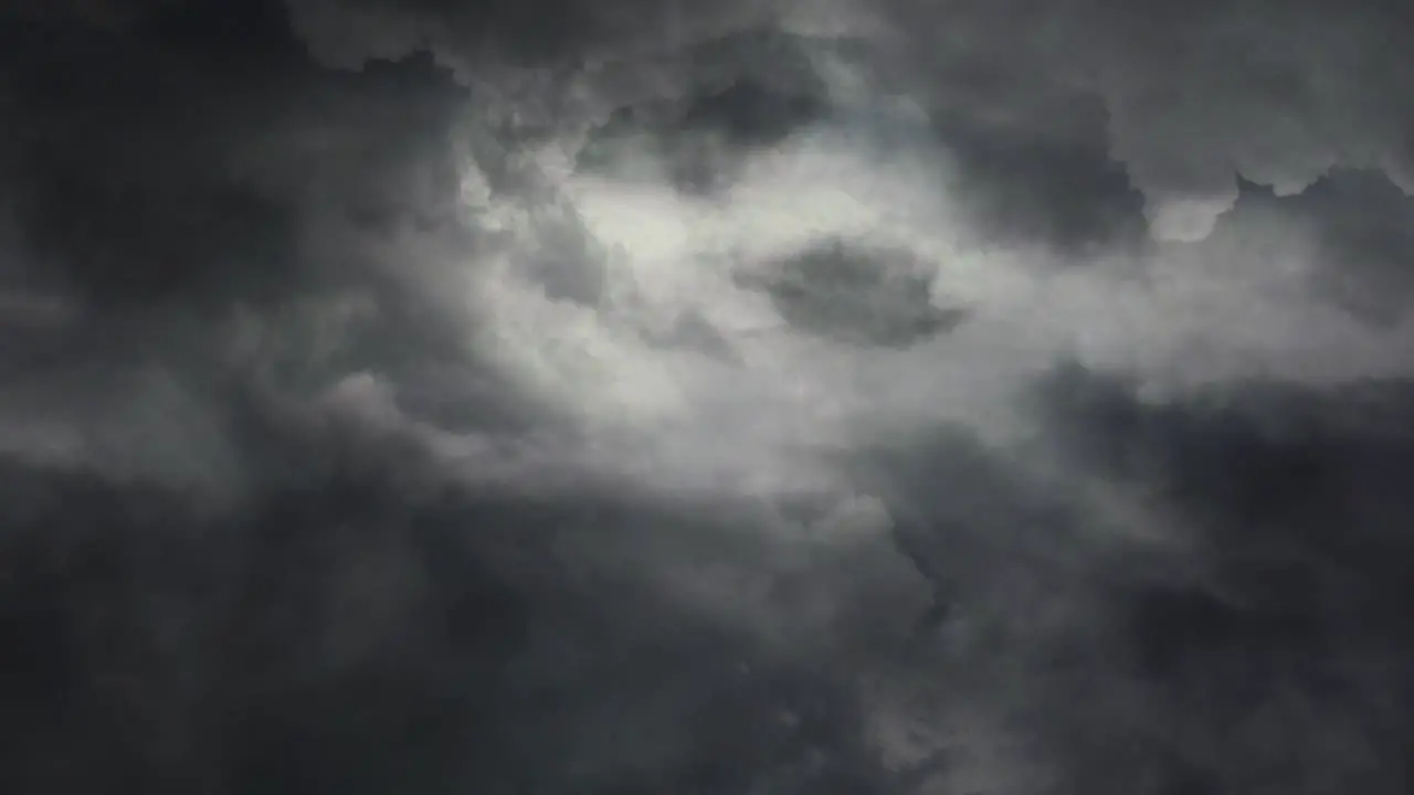 dark storm clouds and striking lightning bolts 4k