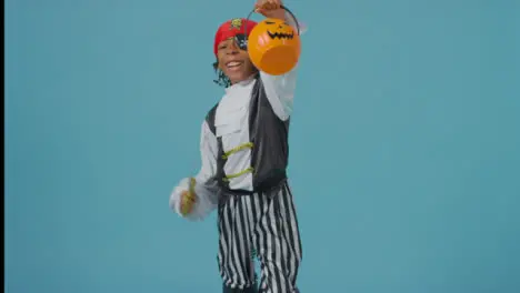 Mid Shot of Little Boy Dressed as Pirate and Smiling