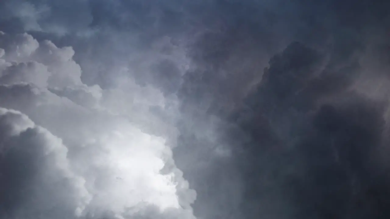 POV lightning flashes dark clouds in the dark sky