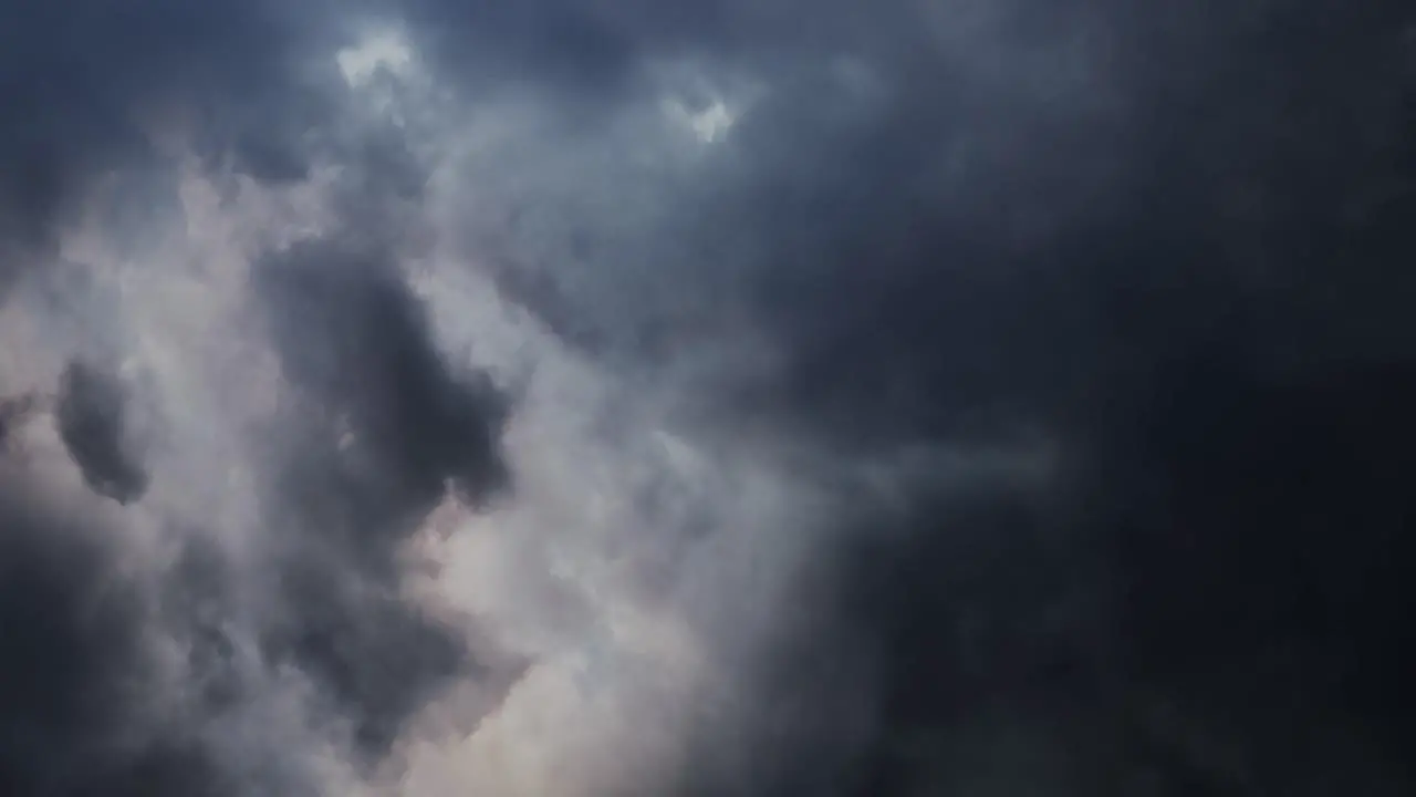 4k lightning strike in dark sky during weather change