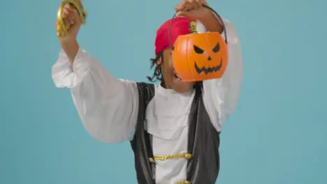 Mid Shot of Boy Dressed Up Saying Trick or Treat