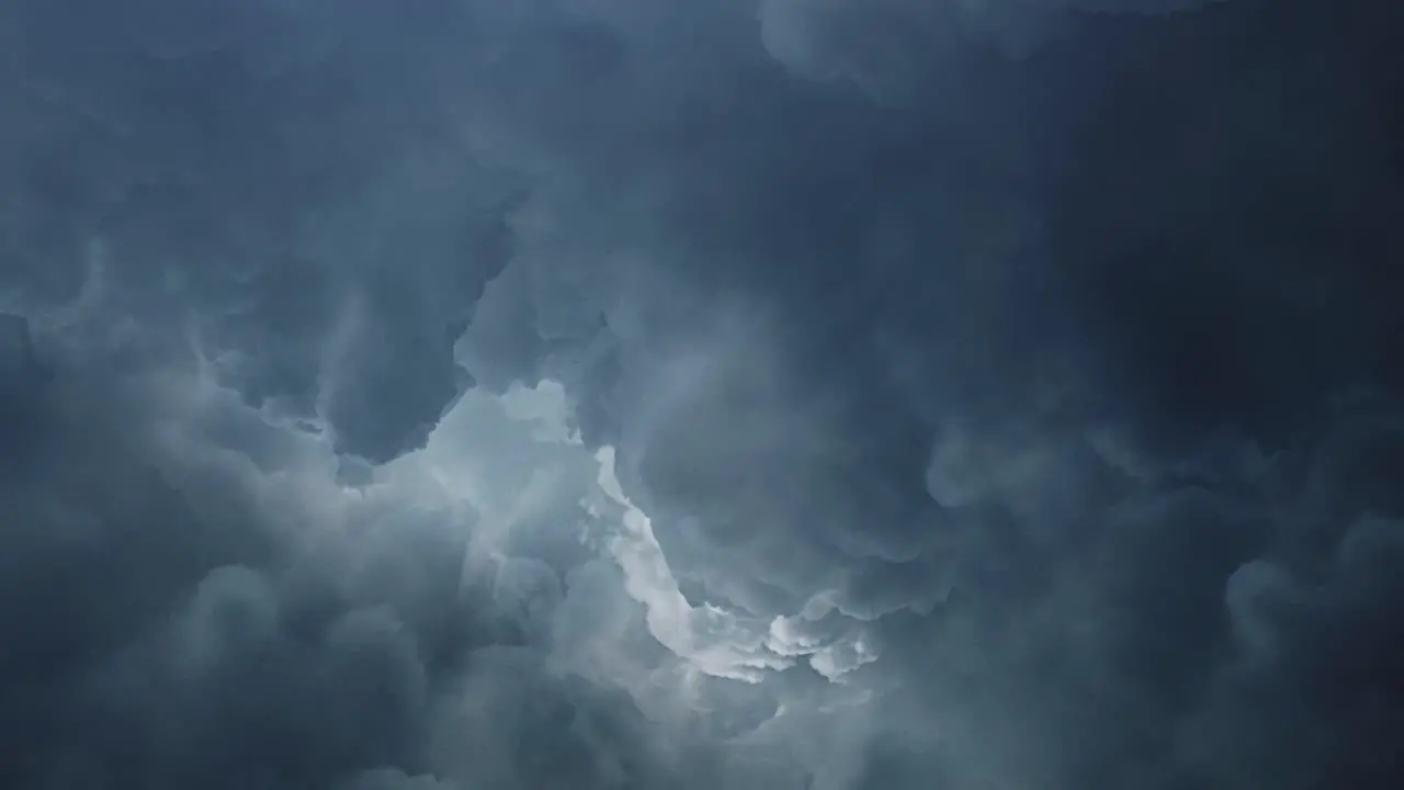 thunderstorm lightning strike in the clouds before the rain 4K