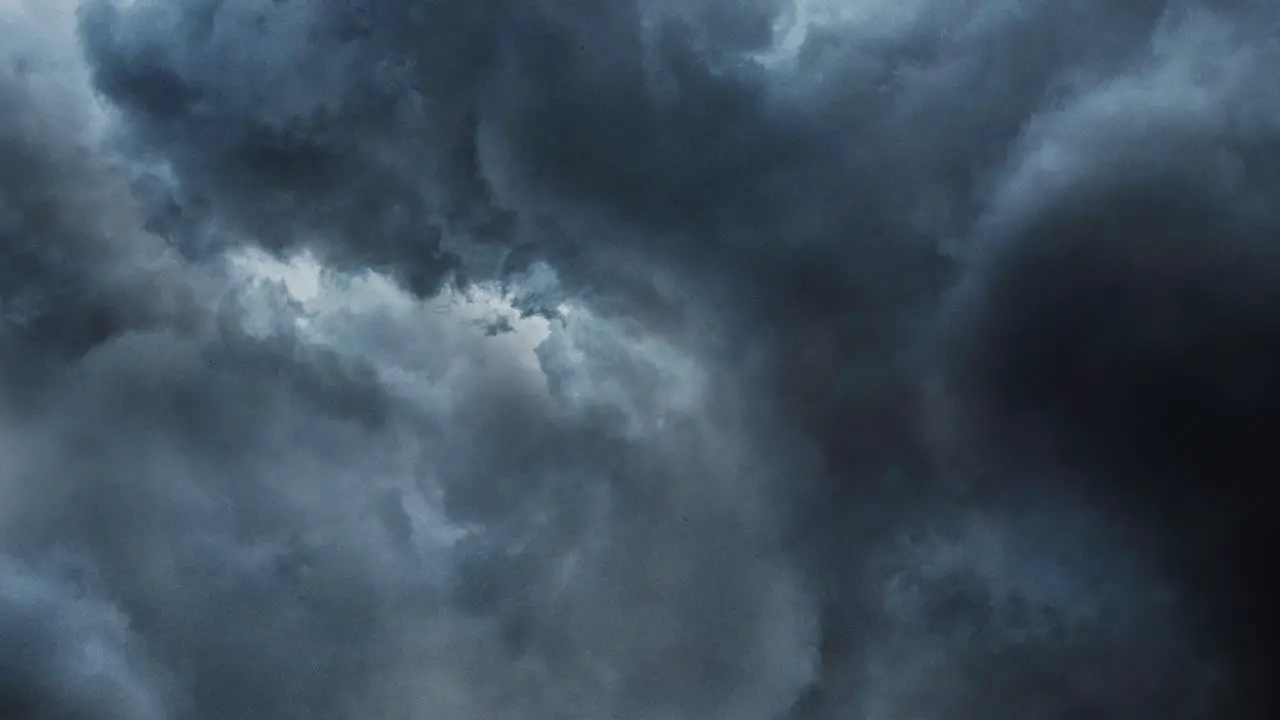 thunderstorm in thick cumulonimbus clouds in the sky