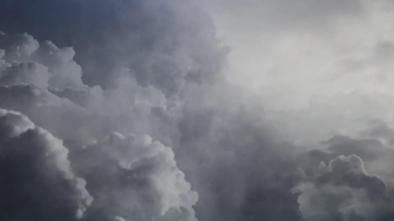 4k view of flying through dark cumulonimbus clouds