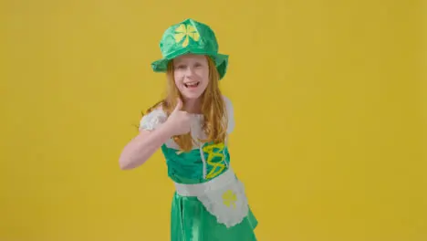 Mid Shot of a Little Girl Skipping Happy St Patrick's Day