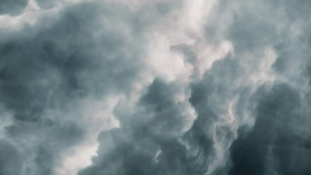 Flying through among clouds thunderstorm in sky