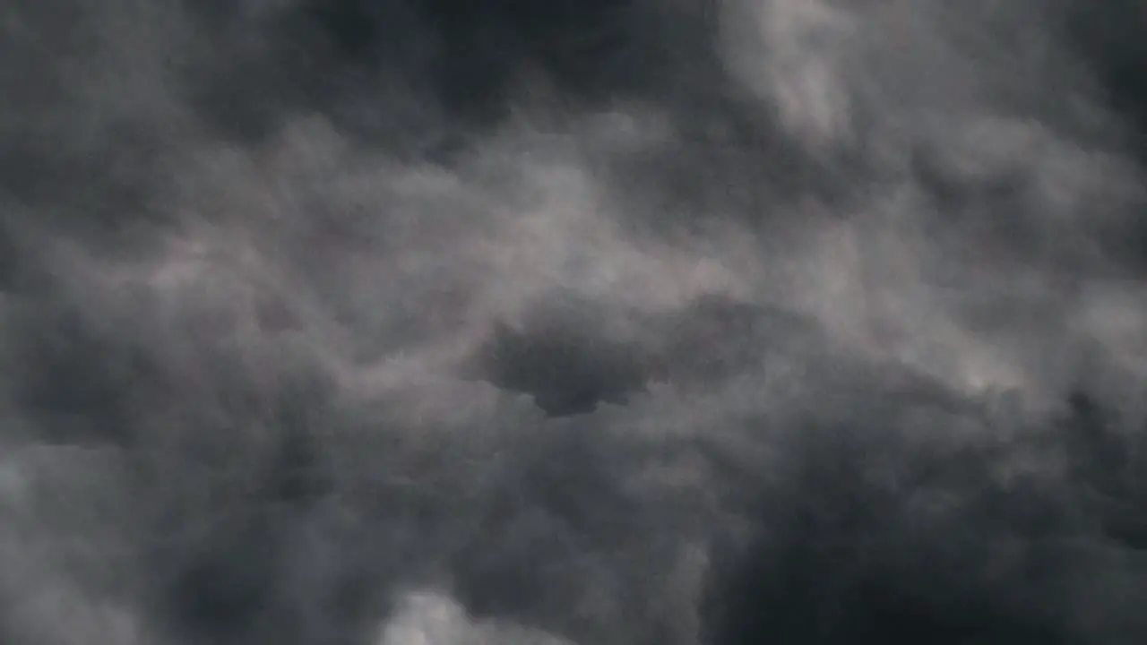 Flying through among clouds during a thunderstorm 4K