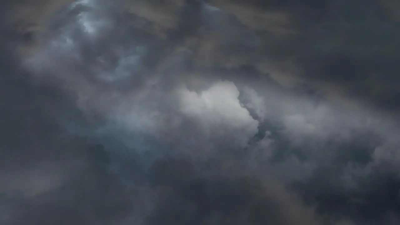 a thunderstorm that broke out in the crevice of the dark cumulonimbus cloud