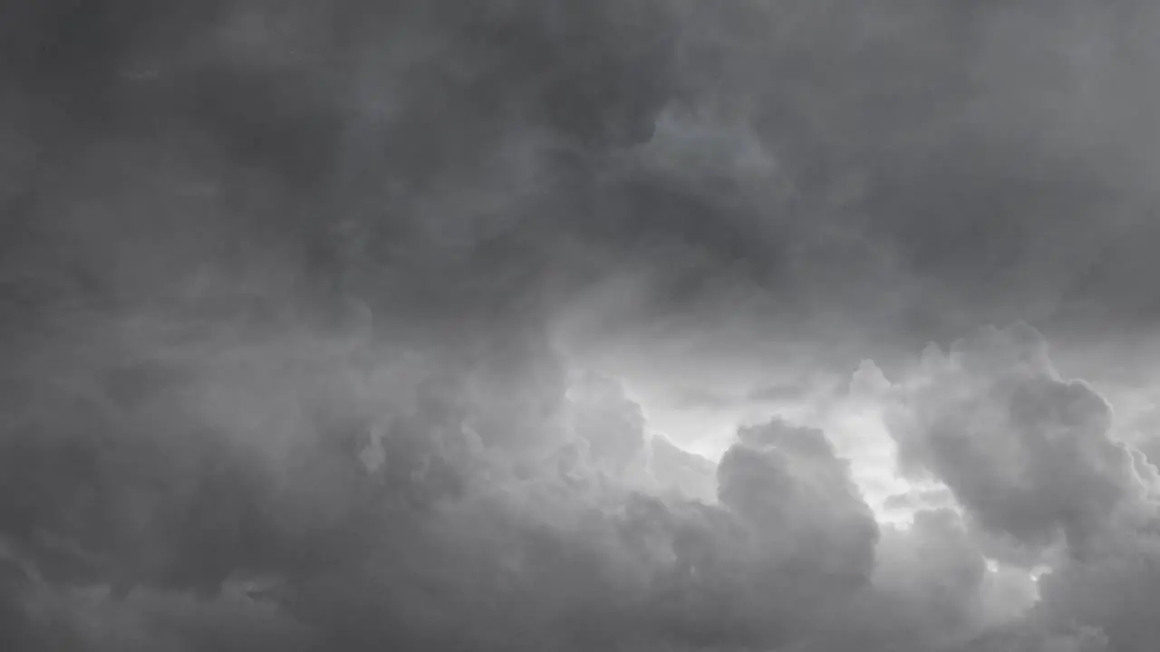 view of lightning strike inside gray dark clouds