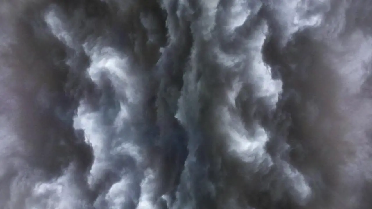 thick cumulonimbus clouds with flashes of lightning