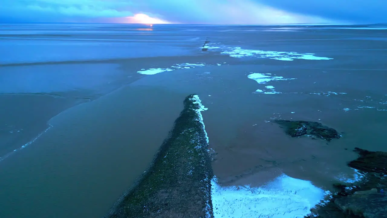 English sunset at beach in stormy conditions at Jenny Brown's Point Silverdale