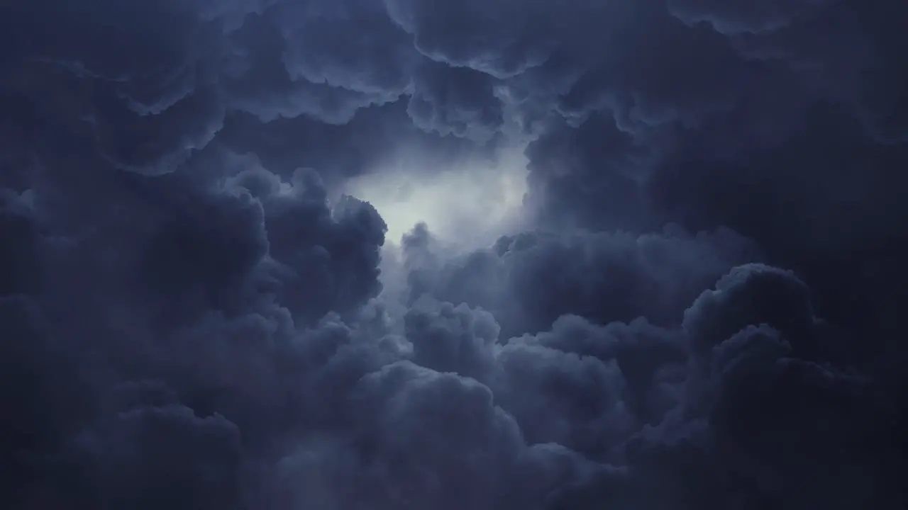 flying through dark clouds with bright light in the sky and thunderstorm